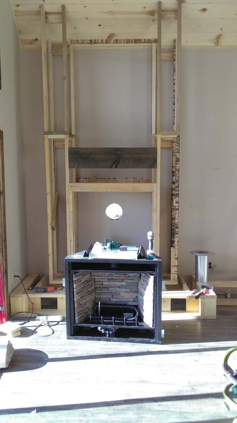 Brookfield fireplace insert and chimney chase framing with flue ready to install.