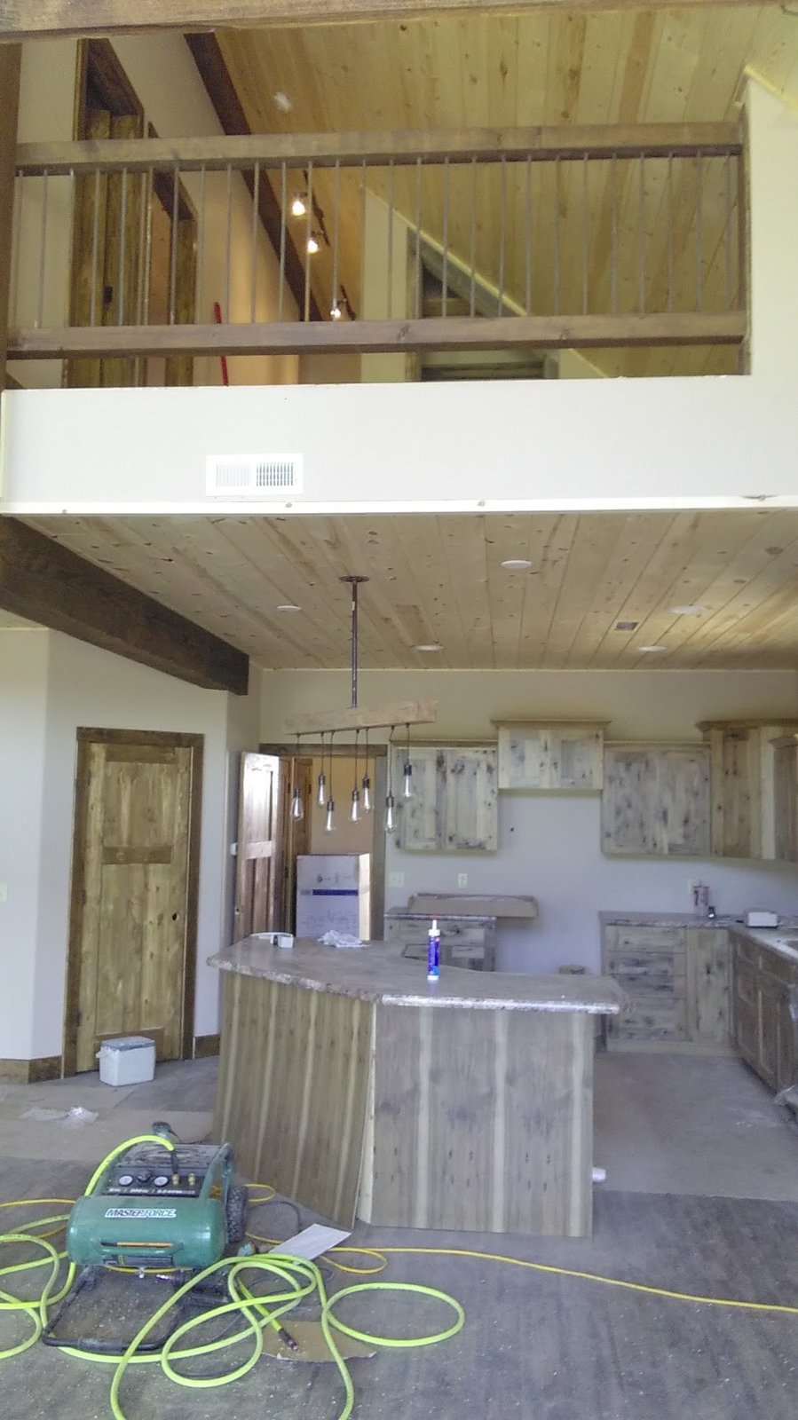 Brookfield kitchen and loft remodel with rustic wood finishes underway.